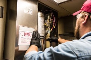 Delta Fire Technician working on Wet Chemical source for a kitchen hood.