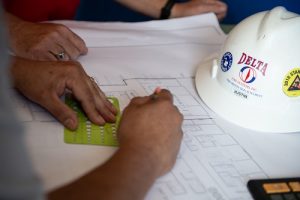 Design board with Delta hard hat